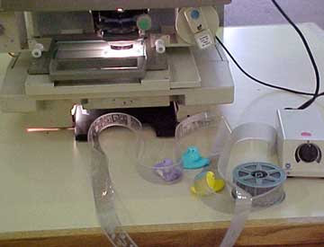 photo of Peeps using microfilm machine without success