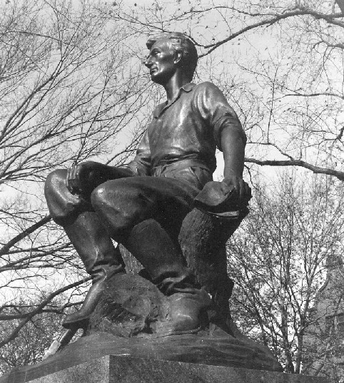 Closeup of side of Lincoln statue showing book in left hand