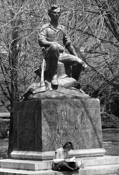 Student studying beneath the Lincoln Statue