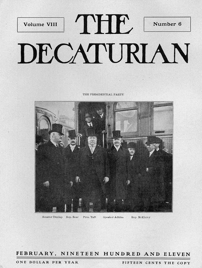Cover of February 1911 Decaturian showing President and party posed in front of ITS train in front of Millikin University