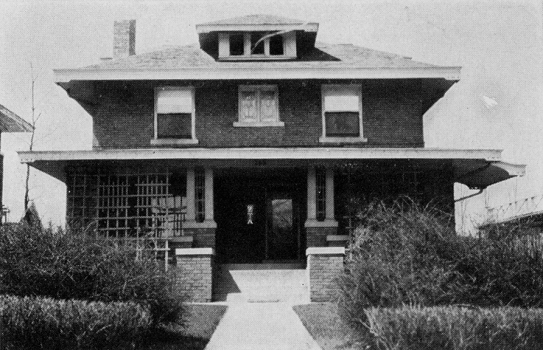 Black and white photo of Huss House