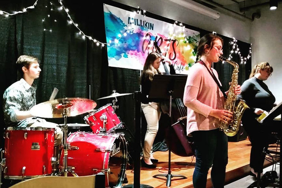 Students playing instruments in a band