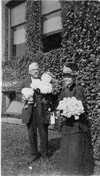 albert taylor holding flowers