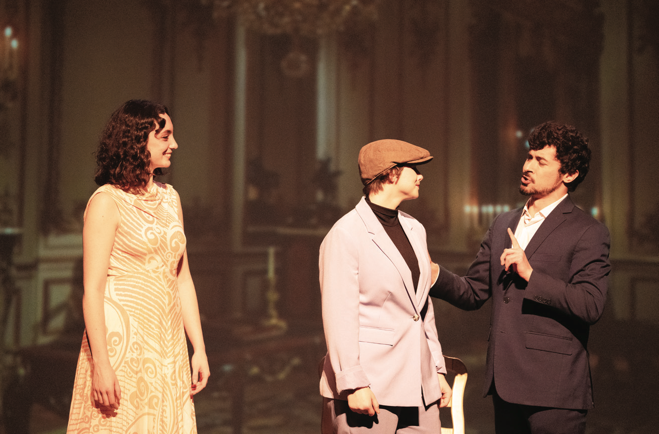 three people performing in an opera