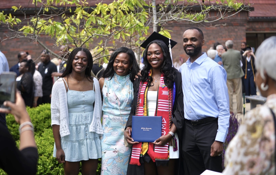 Family after Commencement ceremony with Millikin graduate