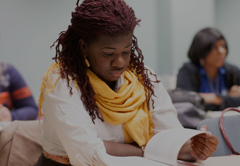 woman reading in classroom