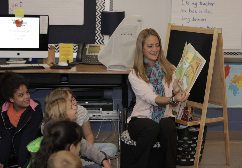 Teacher reading to students