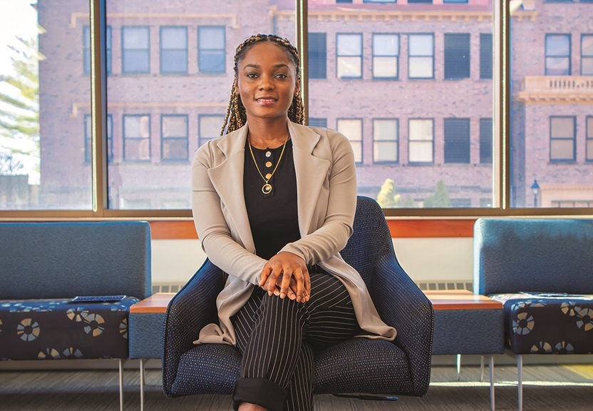 female student sitting in chair