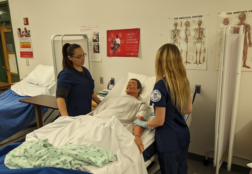 Nursing Students practicing on manikin