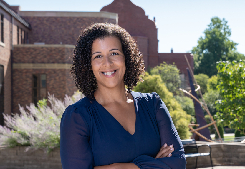 Amber Kaylor Headshot Outside Campus