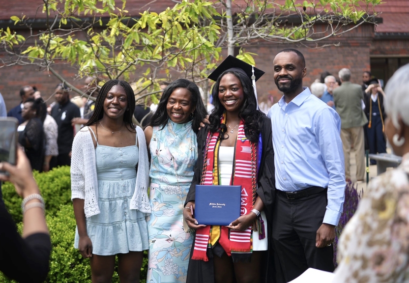 Family after Commencement ceremony with Millikin graduate