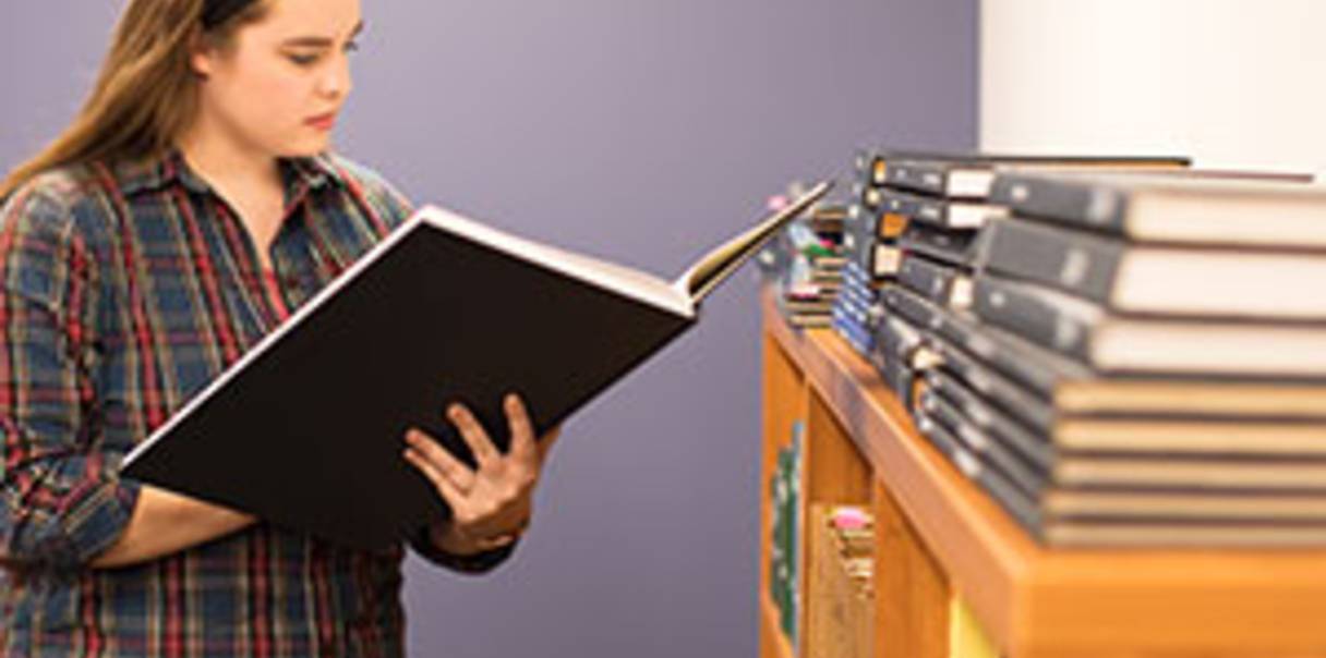 Student reading a book