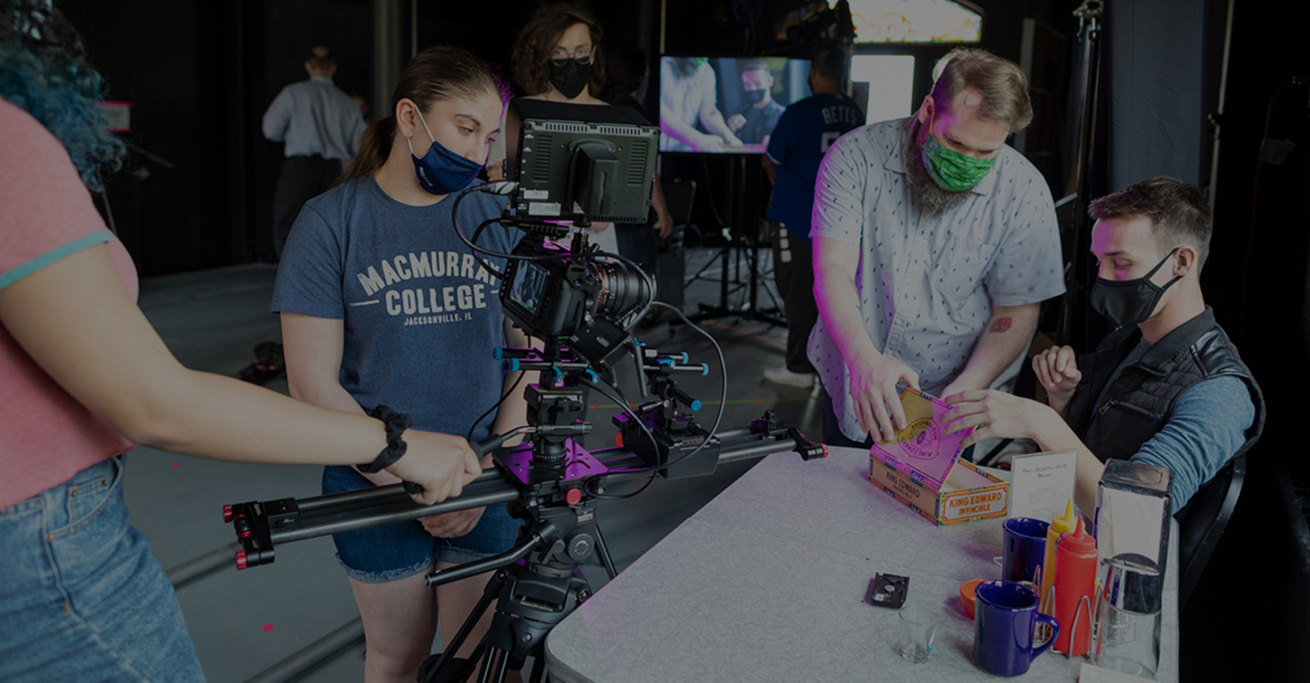 1901 production team using film equipment