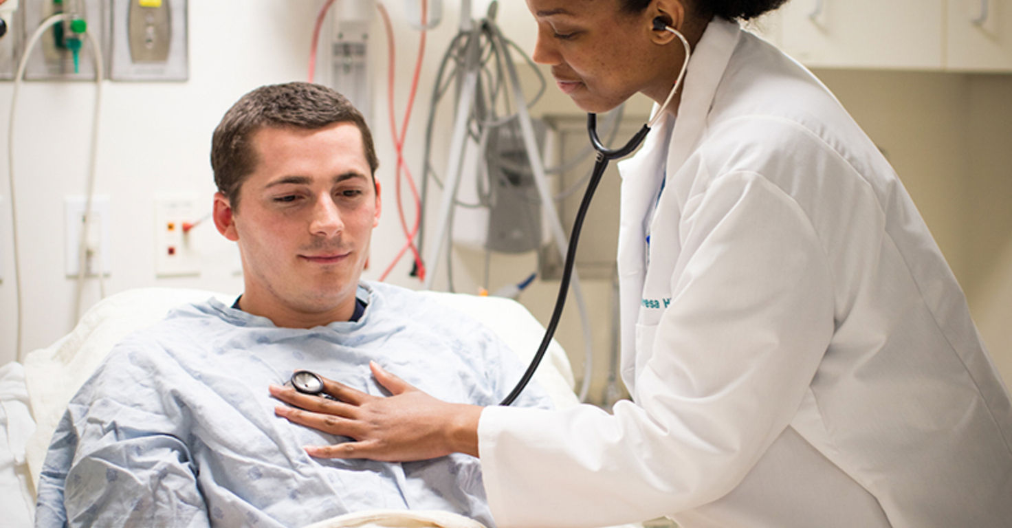 Nurse checking vitals