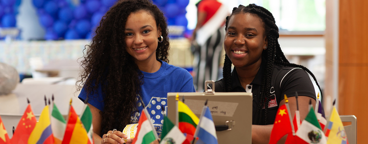 two students smiling