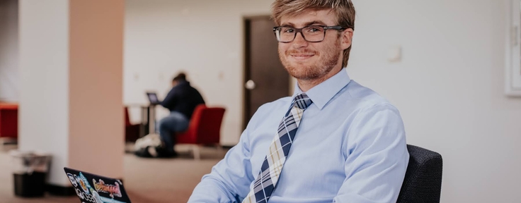 male student studying