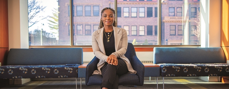 female student sitting in chair