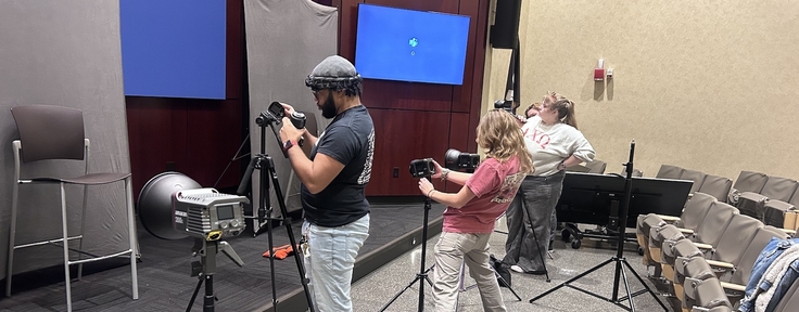 students setting up cameras
