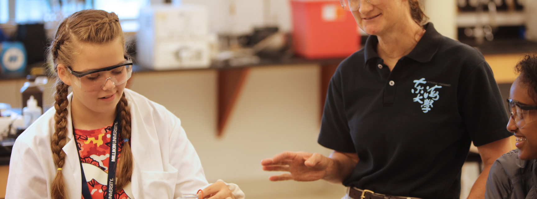 Teacher advising biology student