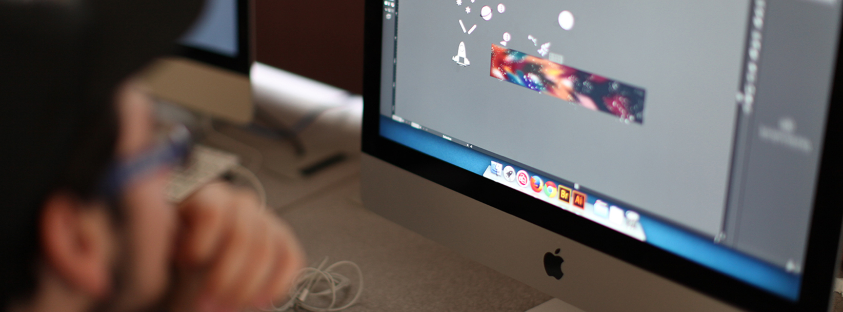student editing an image on computer