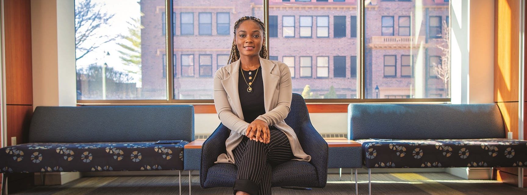 female student sitting in chair