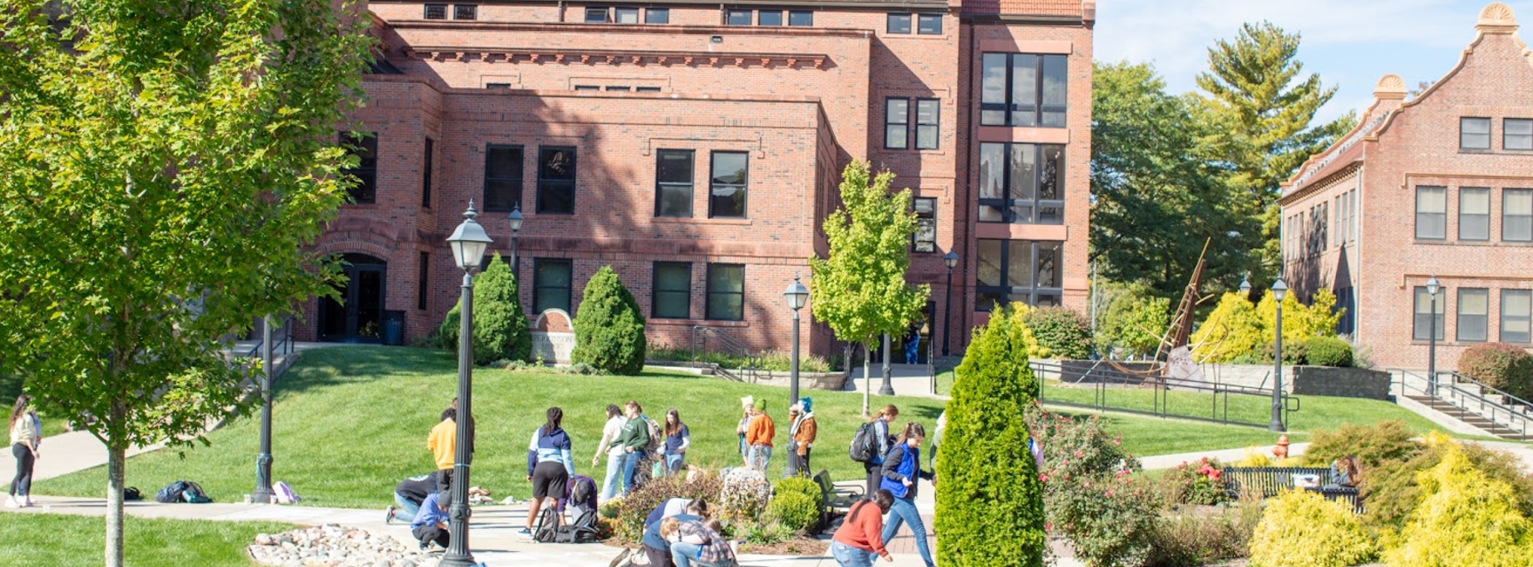 Students chalking sidewalk