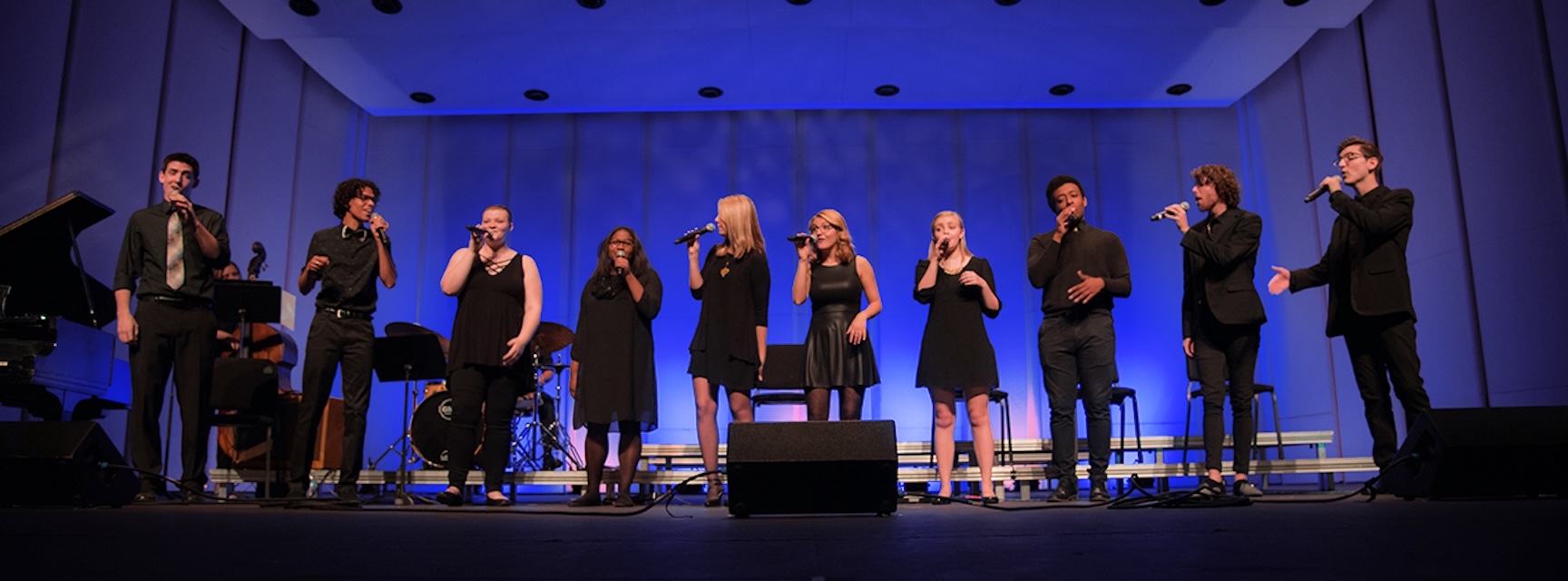 Group of performers on stage