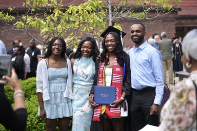 Family after Commencement ceremony with Millikin graduate