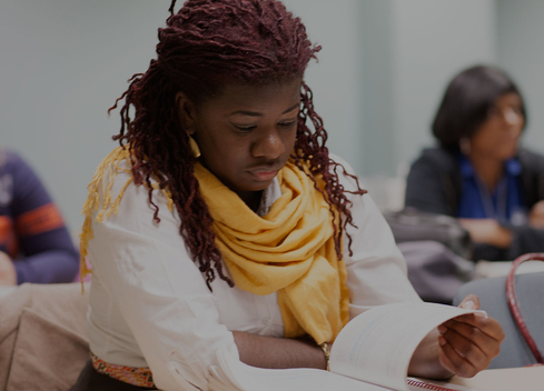 woman reading in classroom