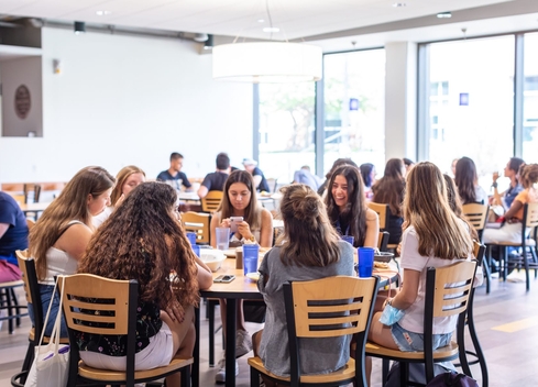 Group of students sitting at a round table