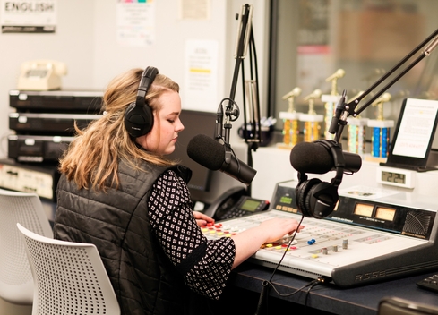 Student with microphone