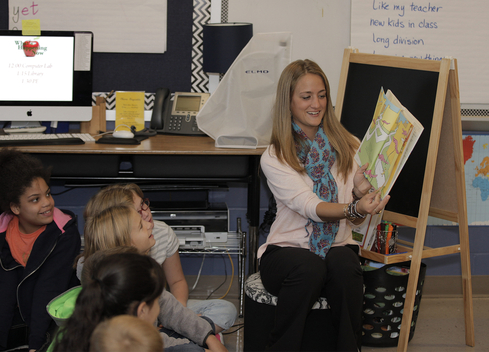 Teacher reading to students