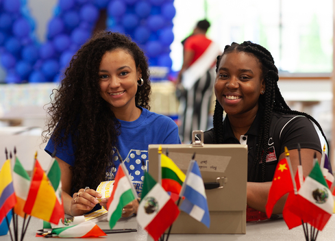 two students smiling