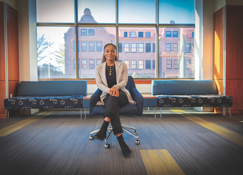 Mba Student sitting smiling