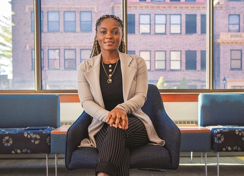 female student sitting in chair