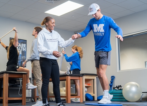 athletic science students practicing balance