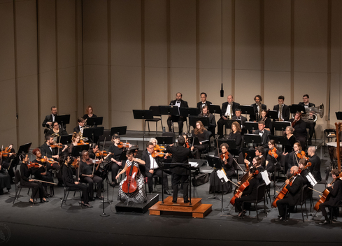 orchestra playing on stage