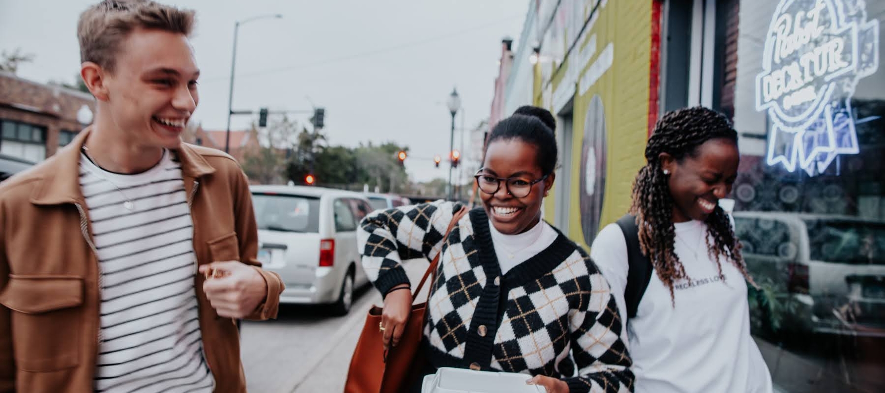 three students walking together