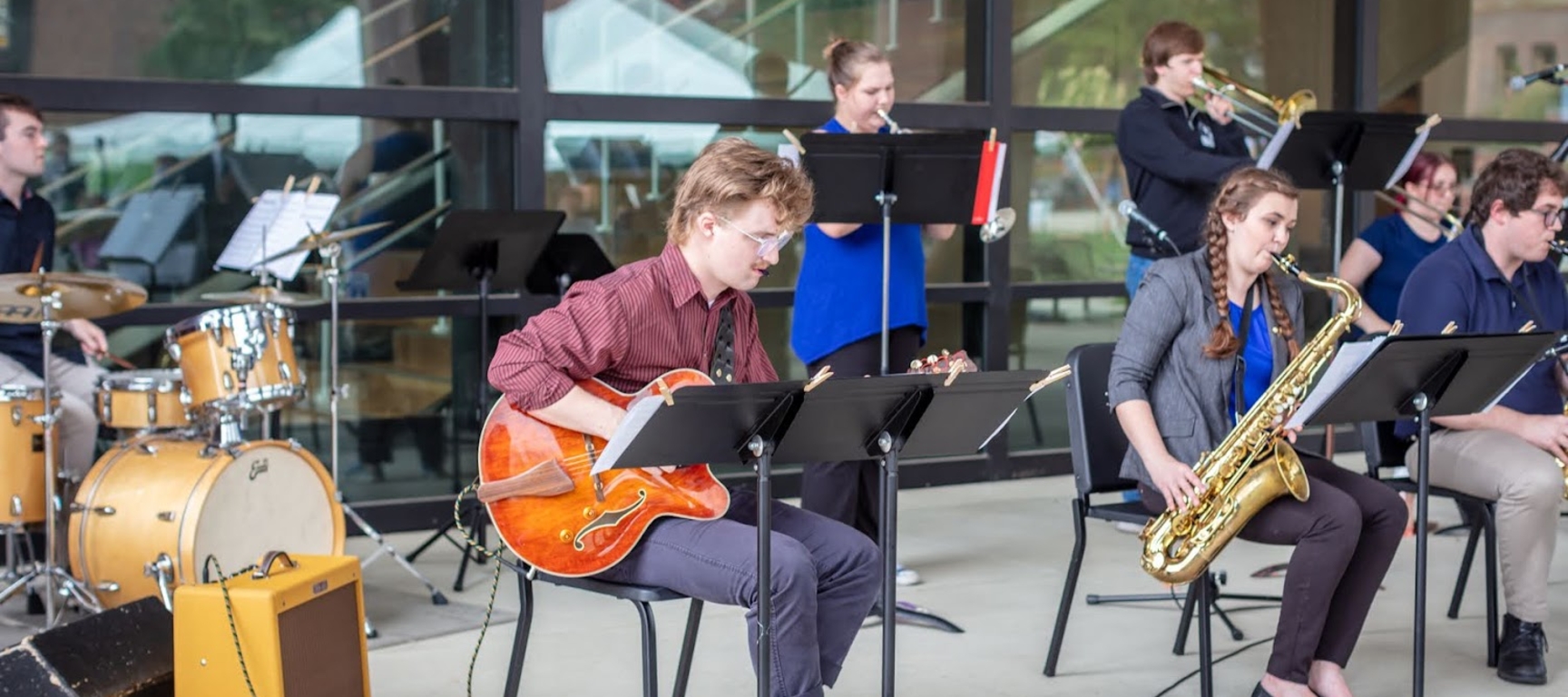 Student playing guitar