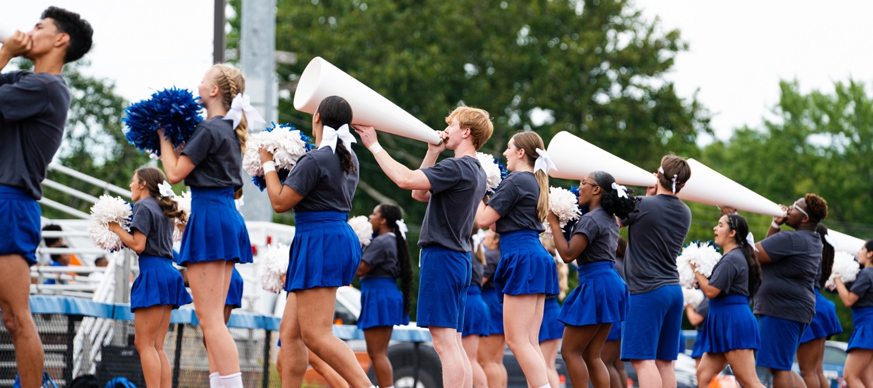 cheerleaders at football game