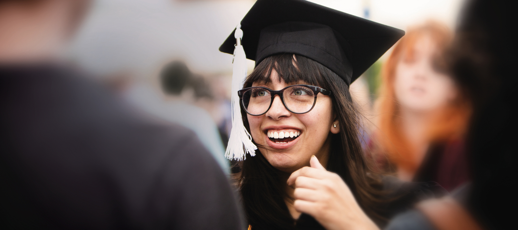 Graduating student smiling
