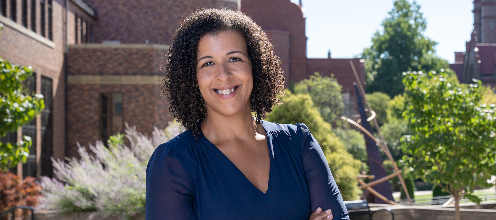 Amber Kaylor Headshot Outside Campus