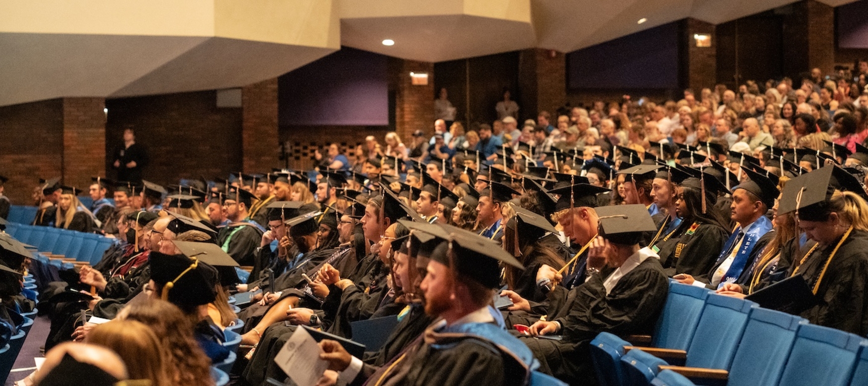 graduating students in auditorium