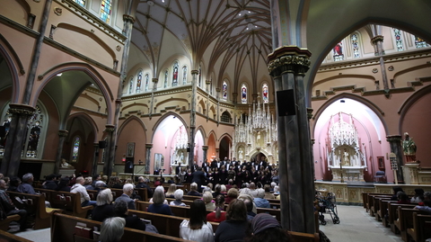 Interior of St. Patrick Church with the University Choir singing