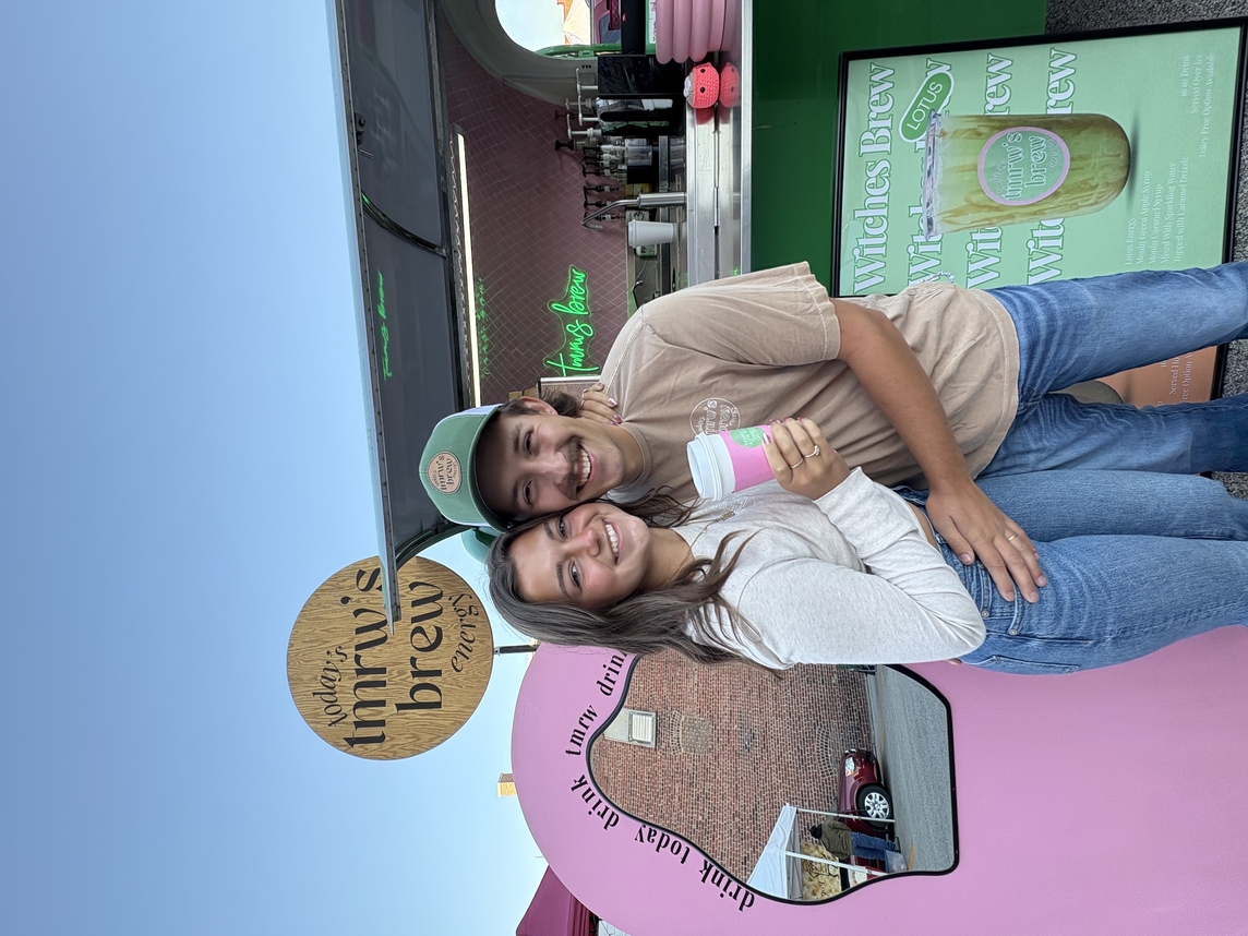 MaryHelen and Robbie Maida pose in front of their TMRW's Brew coffee trailer