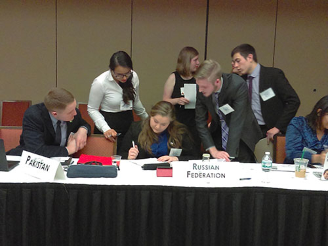 model united nations students doing work