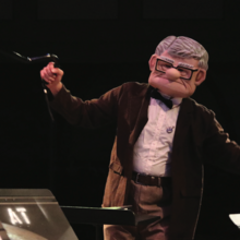 old man conducting