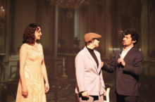 3 people performing in an opera